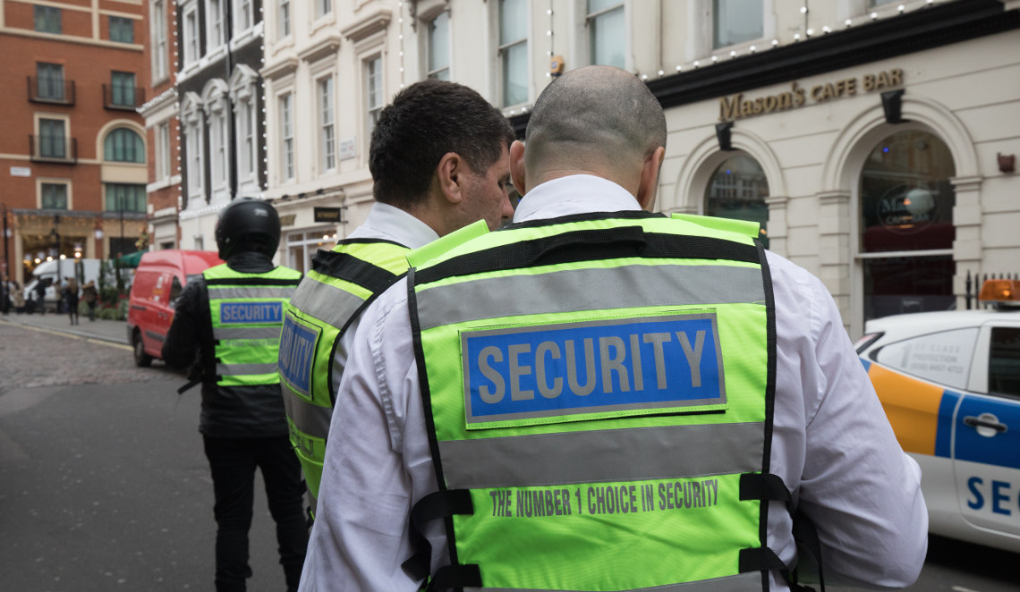 1st Class Protection event security officers wearing high-visibility vests  