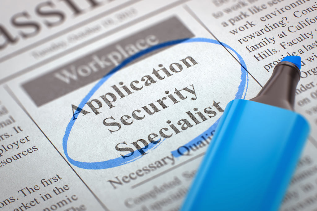 shutterstock 534194617 1st class protection application security specialist role advert in paper